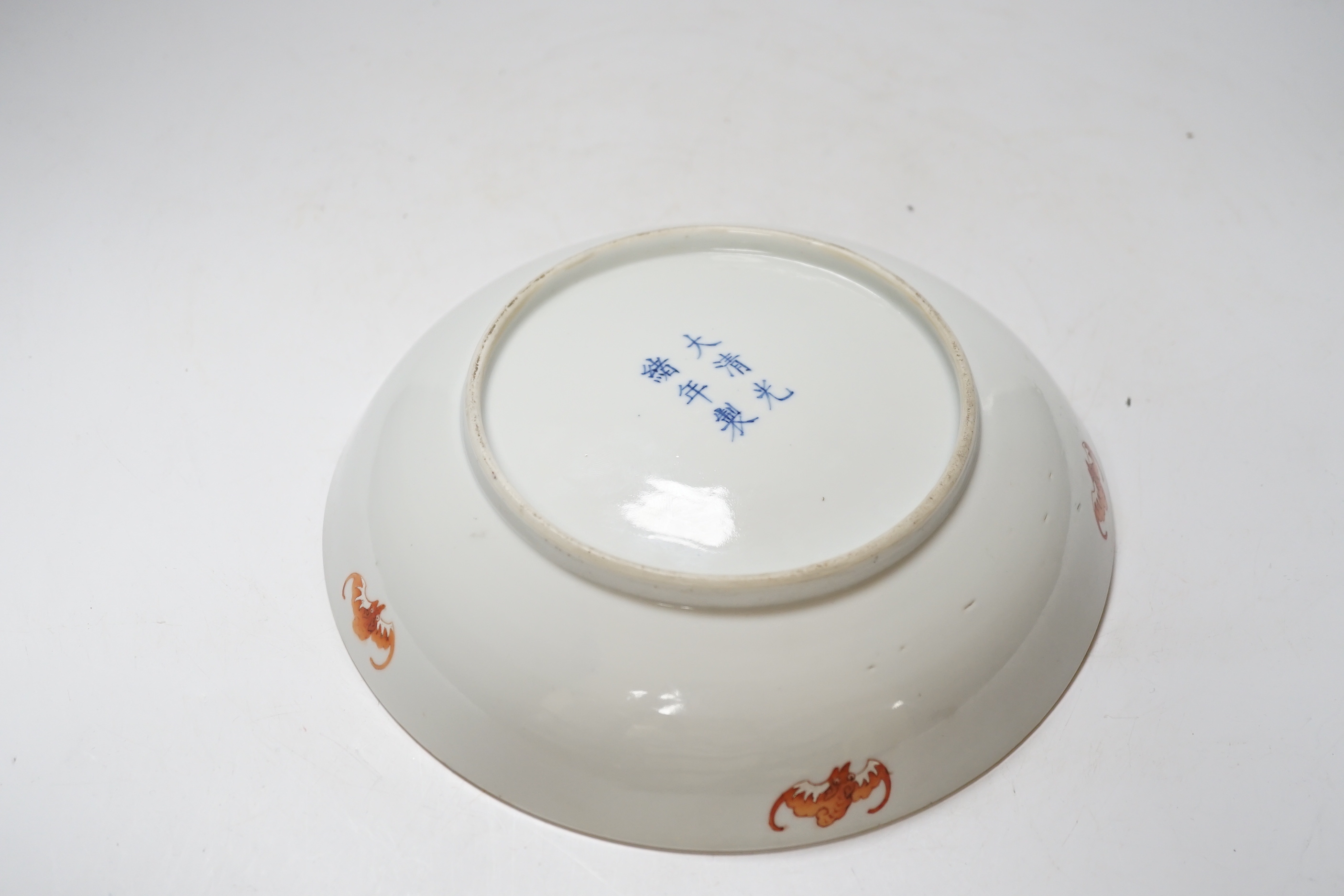 A Chinese enamelled porcelain ‘prunus’ saucer dish, Guangxu six character mark and of the period (1875-1908), 21cm diameter